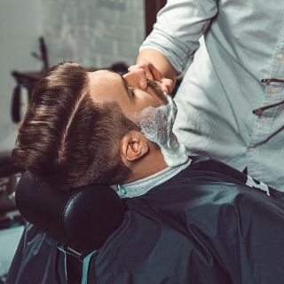 demo-attachment-146-hipster-client-visiting-barber-shop-P349LDW